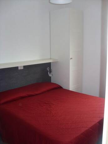 Imagen de la habitación del Hotel De Sio Camping Residence. Foto 20