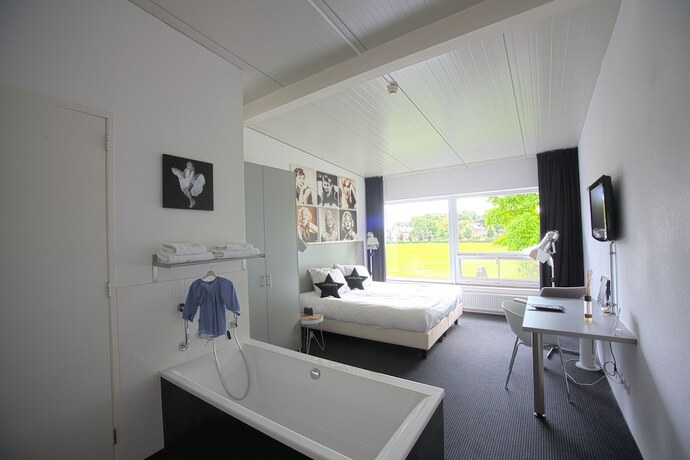 Imagen de la habitación del Hotel De Slaapfabriek. Foto 17