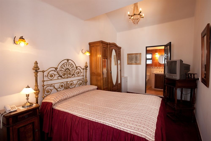 Imagen de la habitación del Hotel De Su Merced. Foto 7