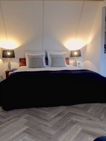 Imagen de la habitación del Hotel De Tabaksplant. Foto 8