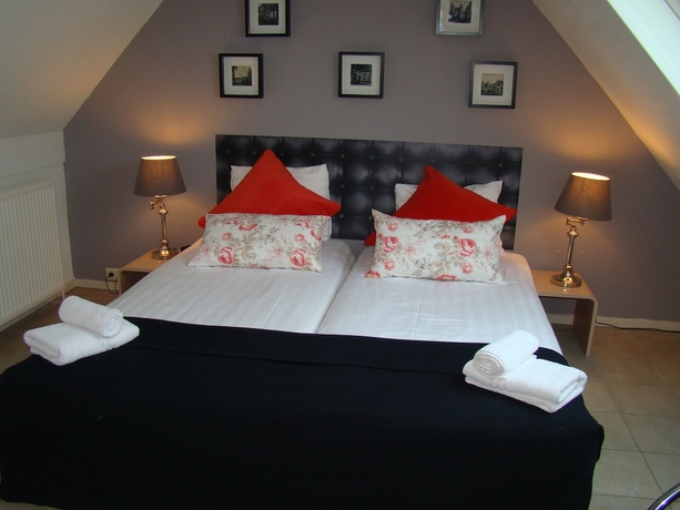 Imagen de la habitación del Hotel De Tabaksplant. Foto 17