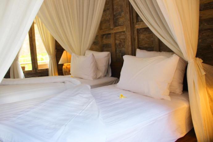 Imagen de la habitación del Hotel De Umah Bali Eco Tradi Home. Foto 8