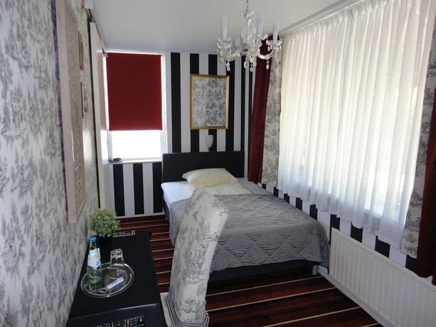 Imagen de la habitación del Hotel De Vier Seizoenen. Foto 5