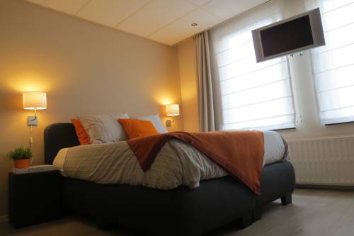 Imagen de la habitación del Hotel De Vierjaargetijden. Foto 10