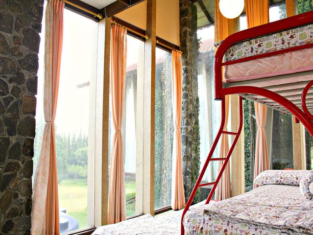 Imagen general del Hotel De Villa Istana Bunga By Houseinbandung. Foto 5