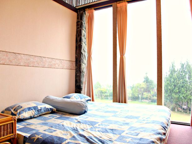 Imagen de la habitación del Hotel De Villa Istana Bunga By Houseinbandung. Foto 8