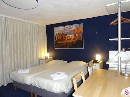 Imagen de la habitación del Hotel De Waag. Foto 2