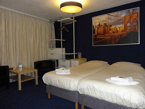 Imagen de la habitación del Hotel De Waag. Foto 3