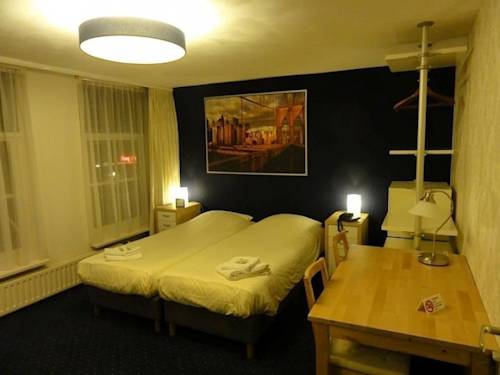 Imagen de la habitación del Hotel De Waag. Foto 4