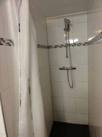 Imagen de la habitación del Hotel De Waag. Foto 7