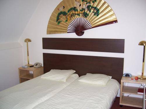 Imagen de la habitación del Hotel De Weyman. Foto 11