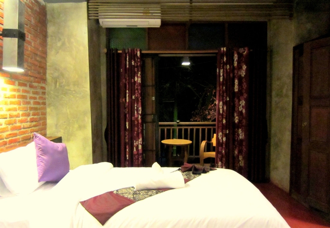 Imagen de la habitación del Hotel De Wiang Kum Kam. Foto 9