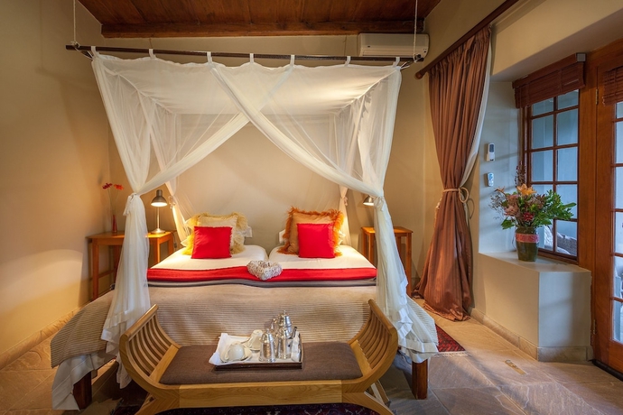 Imagen de la habitación del Hotel De Zeekoe Guest Farm. Foto 2