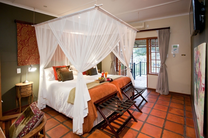 Imagen de la habitación del Hotel De Zeekoe Guest Farm. Foto 3