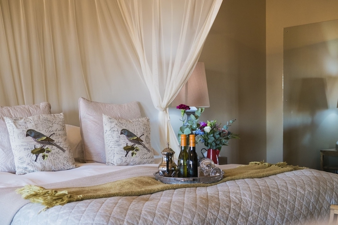 Imagen de la habitación del Hotel De Zeekoe Guest Farm. Foto 9