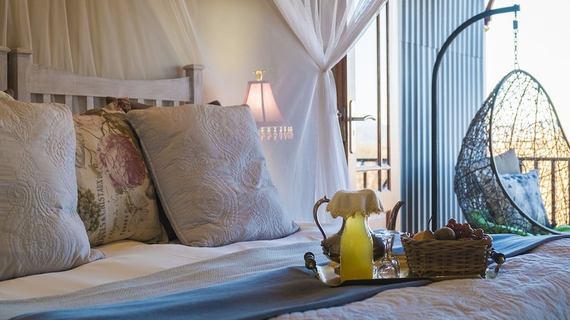 Imagen de la habitación del Hotel De Zeekoe Guest Farm. Foto 16