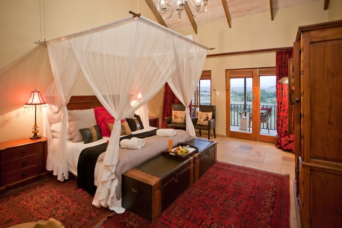 Imagen de la habitación del Hotel De Zeekoe Guest Farm. Foto 18