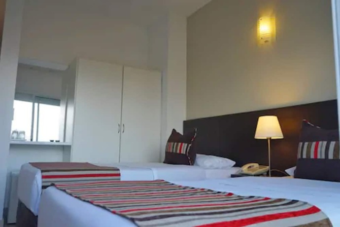 Imagen de la habitación del Hotel De la Plaza. Foto 8