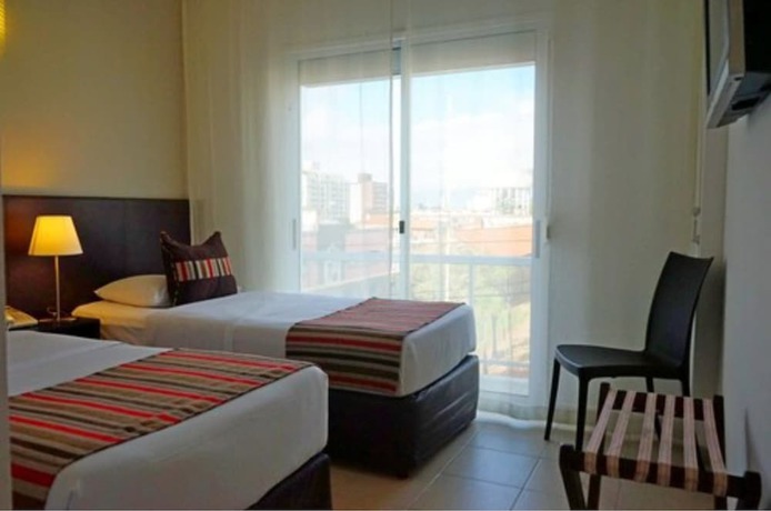 Imagen de la habitación del Hotel De la Plaza. Foto 9