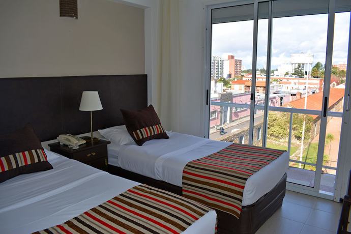 Imagen de la habitación del Hotel De la Plaza. Foto 13