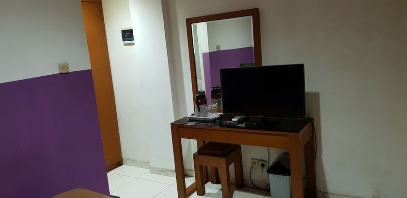 Imagen de la habitación del Hotel DeQur Jakarta Kota. Foto 8