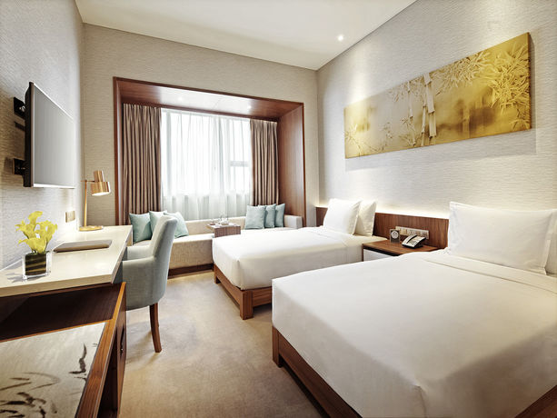 Imagen de la habitación del Hotel Deacon House Wuxi. Foto 7