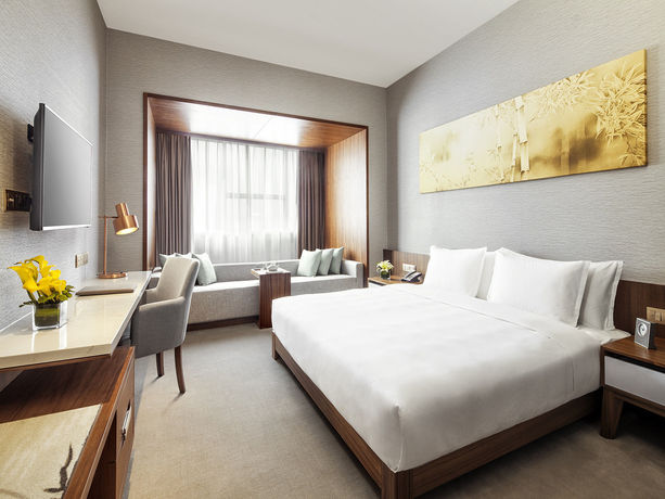 Imagen de la habitación del Hotel Deacon House Wuxi. Foto 8