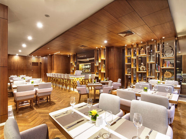 Imagen del bar/restaurante del Hotel Deacon House Wuxi. Foto 6