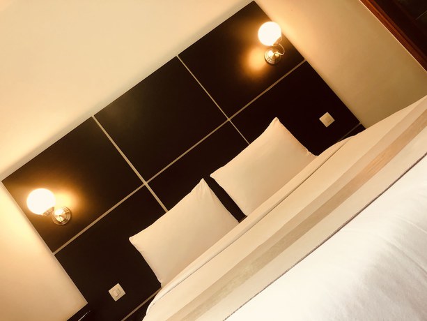 Imagen de la habitación del Hotel D&eacute;tente H&ocirc;tel. Foto 6