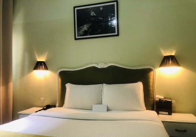 Imagen de la habitación del Hotel D&eacute;tente H&ocirc;tel. Foto 10