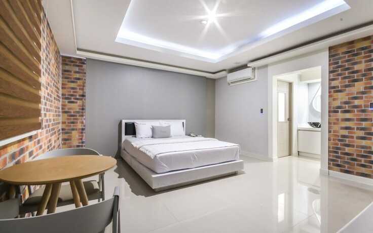 Imagen de la habitación del Hotel Deagu Seongseo CF. Foto 14