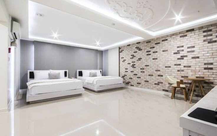 Imagen de la habitación del Hotel Deagu Seongseo CF. Foto 16