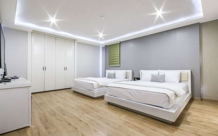 Imagen de la habitación del Hotel Deagu Seongseo CF. Foto 17