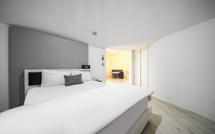 Imagen de la habitación del Hotel Deagu Seongseo CF. Foto 19