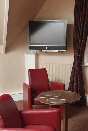 Imagen de la habitación del Hotel Dean Court. Foto 9