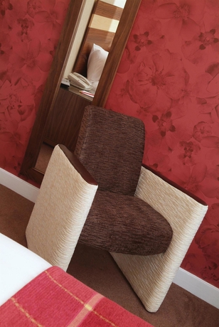 Imagen de la habitación del Hotel Dean Court. Foto 10