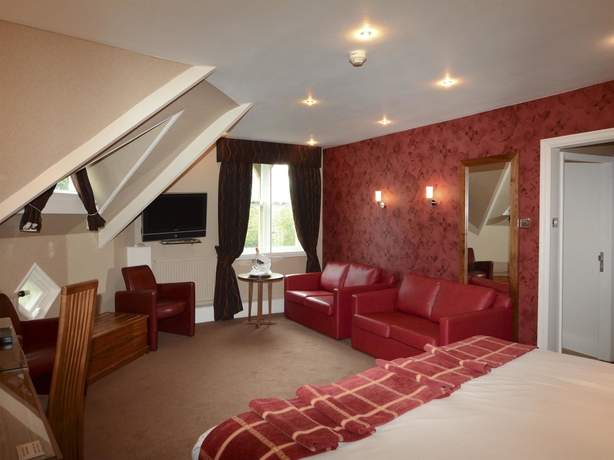 Imagen de la habitación del Hotel Dean Court. Foto 11