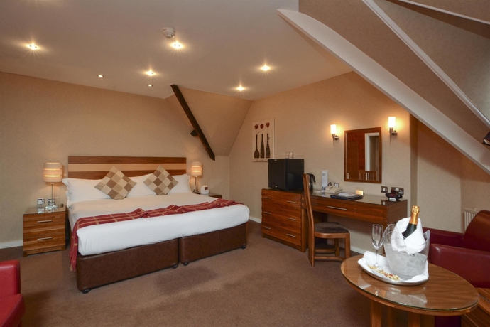 Imagen de la habitación del Hotel Dean Court. Foto 12