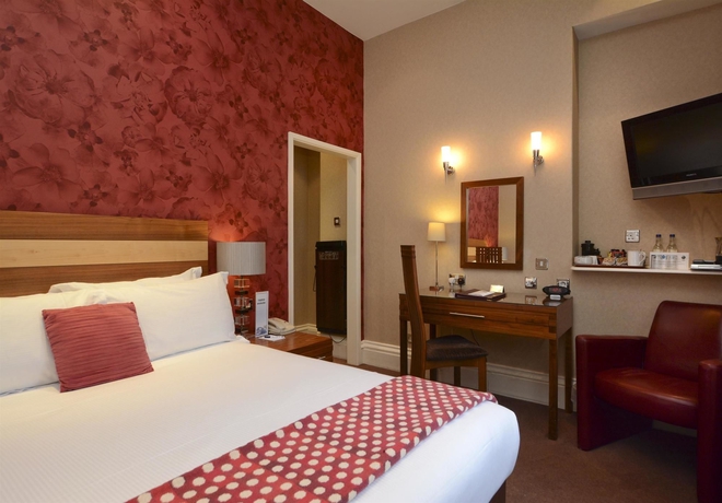 Imagen de la habitación del Hotel Dean Court. Foto 14