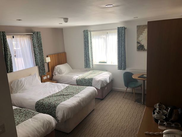 Imagen de la habitación del Hotel DeanGate Motel. Foto 12