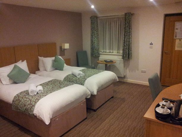 Imagen de la habitación del Hotel DeanGate Motel. Foto 15