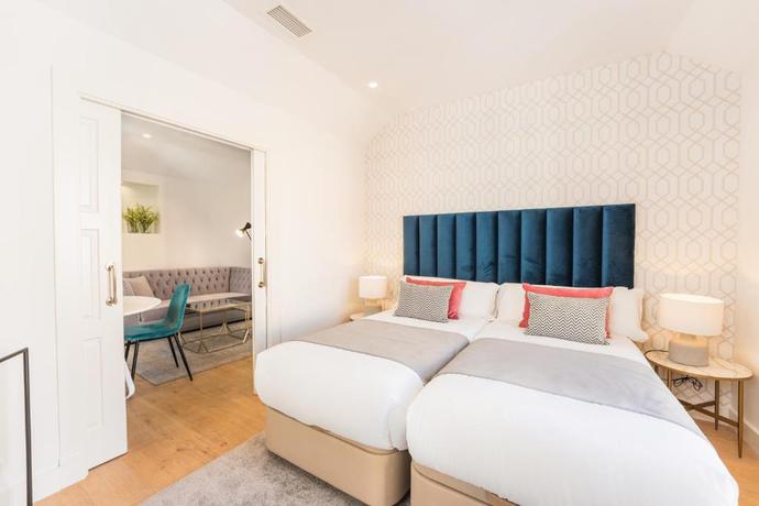 Imagen de la habitación del Hotel Debambú Suites. Foto 5