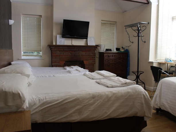 Imagen de la habitación del Hotel Debden Guest House. Foto 2