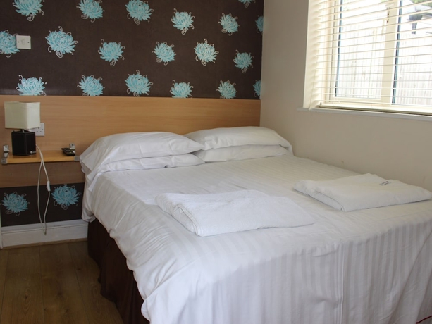 Imagen de la habitación del Hotel Debden Guest House. Foto 4