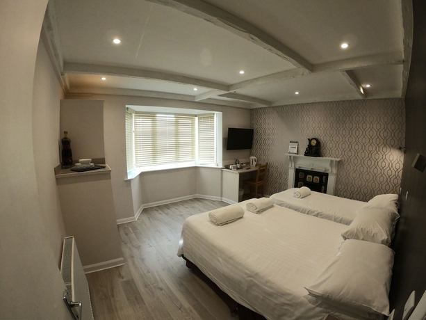 Imagen de la habitación del Hotel Debden Guest House. Foto 7
