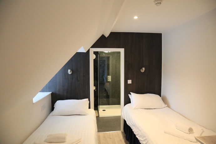 Imagen de la habitación del Hotel Debden Guest House. Foto 8