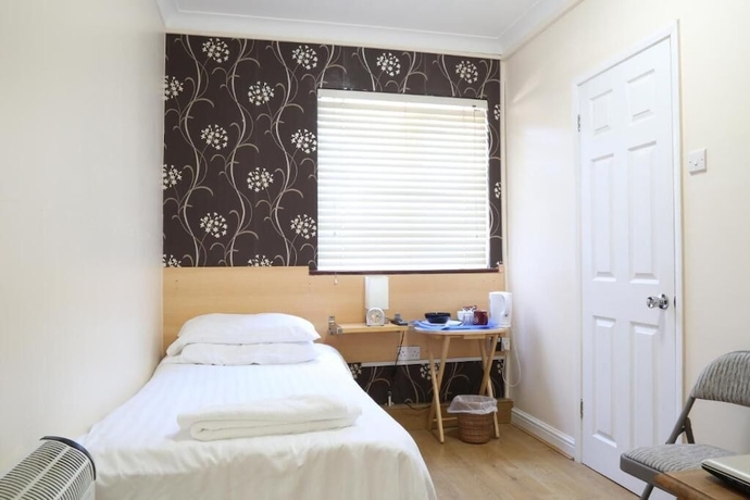 Imagen de la habitación del Hotel Debden Guest House. Foto 10