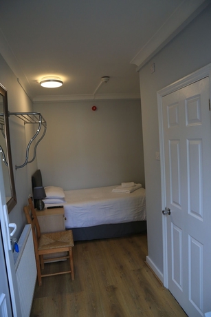 Imagen de la habitación del Hotel Debden Guest House. Foto 11
