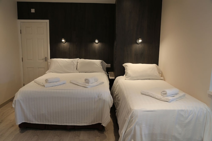 Imagen de la habitación del Hotel Debden Guest House. Foto 13
