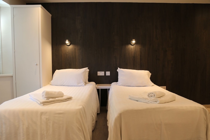 Imagen de la habitación del Hotel Debden Guest House. Foto 14